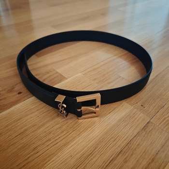 Black leather belt with gold buckle