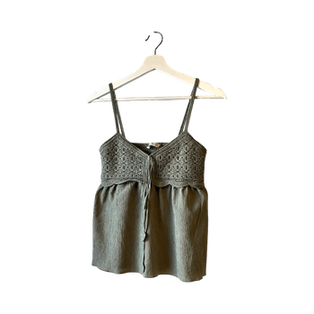 Vihreä hihaton pusero