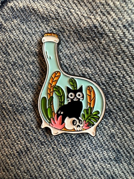 Cat skull enamel pin