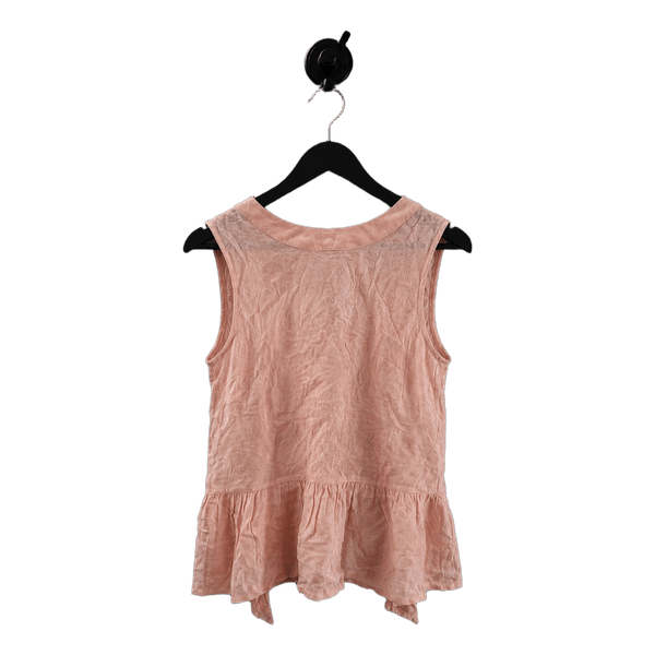 Pink peplum sleeveless top