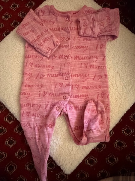 Pink baby onesie