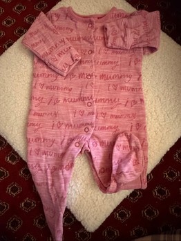 Pink baby onesie