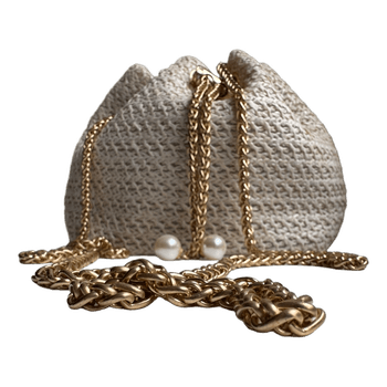 Beige straw bucket bag
