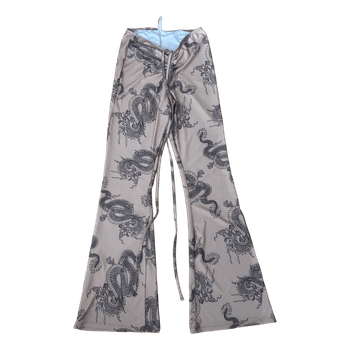 Beige dragon print trousers