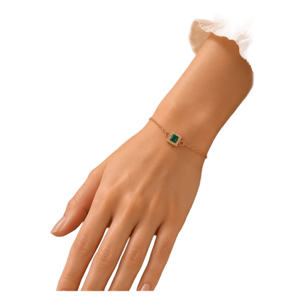 Goldfarbenes Armband mit grünem Stein
