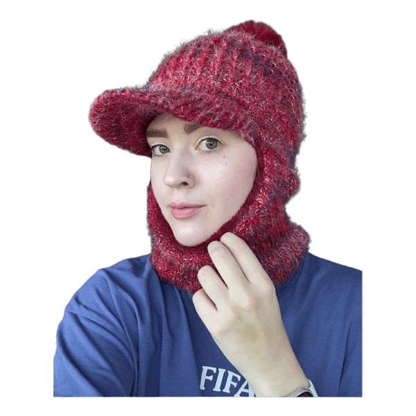 Knitted balaclava hood with a visor and pom-pom