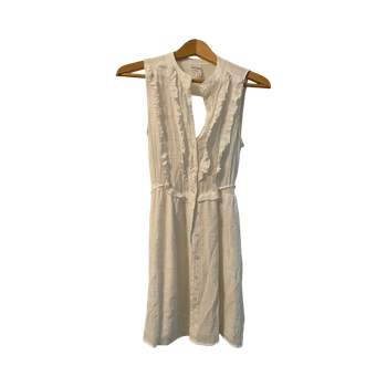 White sleeveless button dress