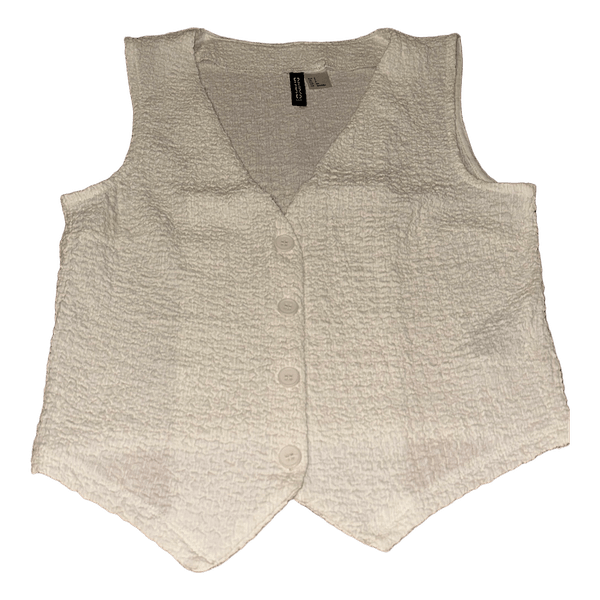 White buttoned vest