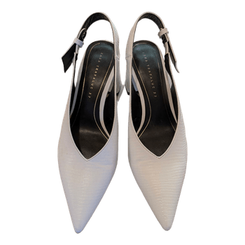White pointed slingback heels
