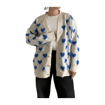 White cardigan with blue heart pattern