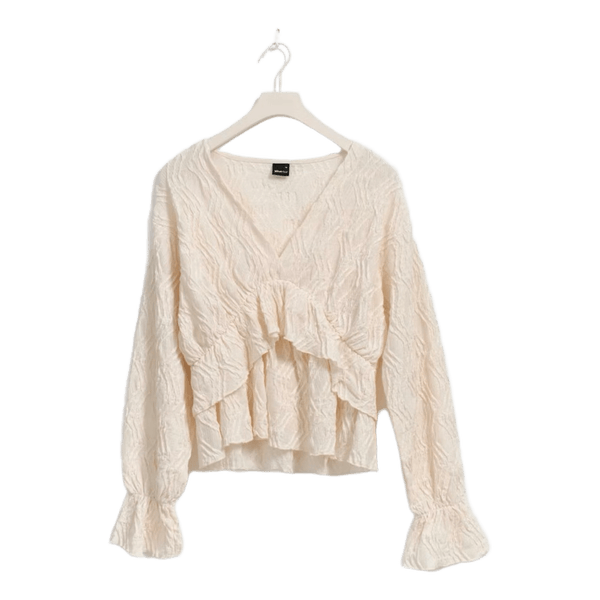 beige långärmad blus