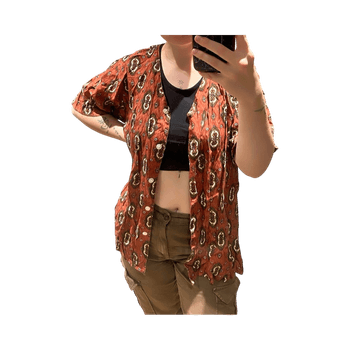 Oranssi kuviollinen paita