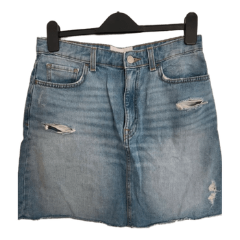 Distressed blue denim skirt