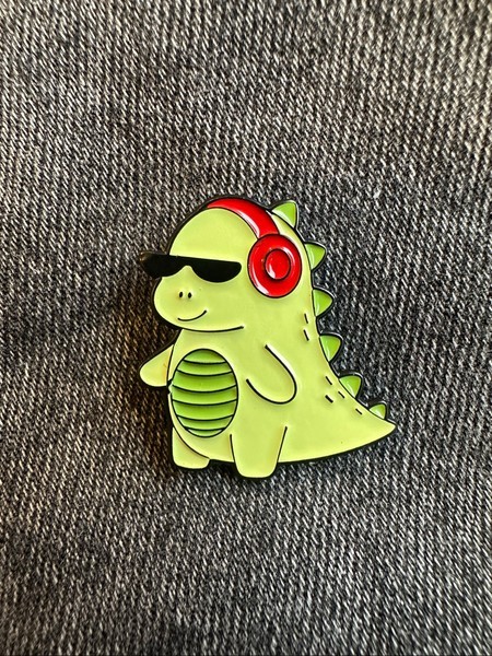 Dinosaur enamel pin