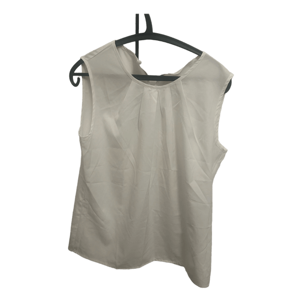 White sleeveless blouse