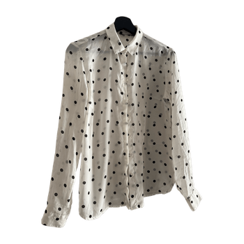 valkoinen mustapilkullinen paita