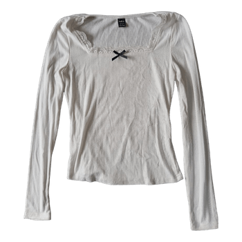 White long-sleeve top