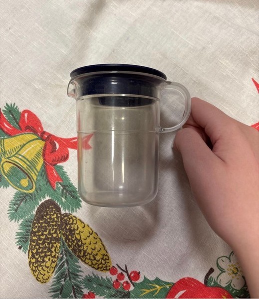 Small plastic measuring jug