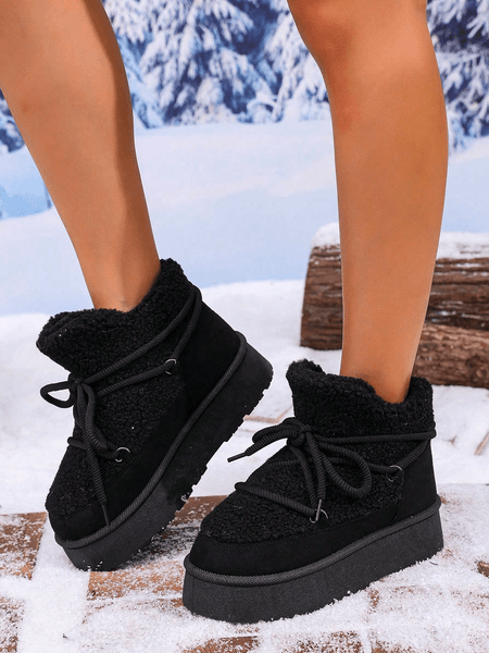 Thick-soled snow boots