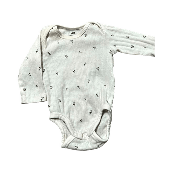 Valkoinen vauvan body