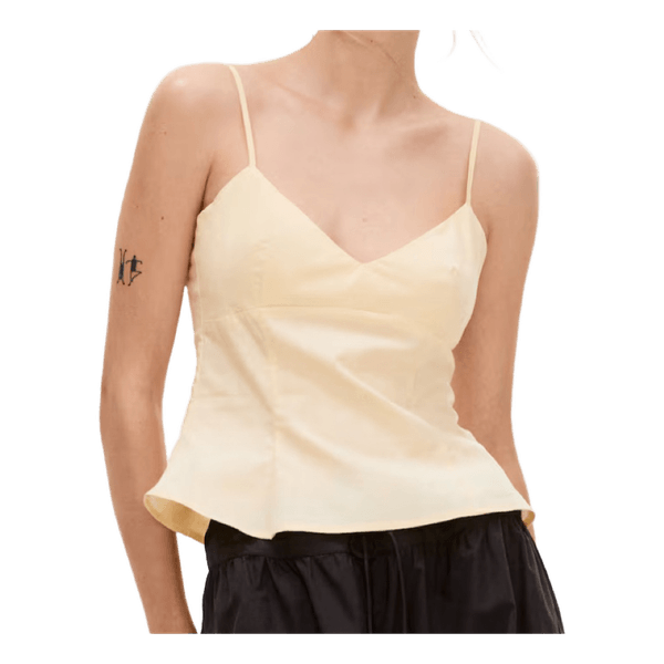 Keltainen peplum-toppi