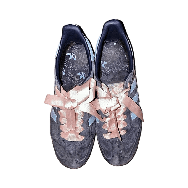 Blue sneakers with pink laces