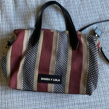 Striped woven handbag