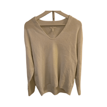 Valkoinen v‑neck neule