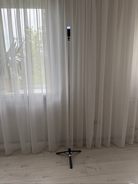 Phone tripod with light