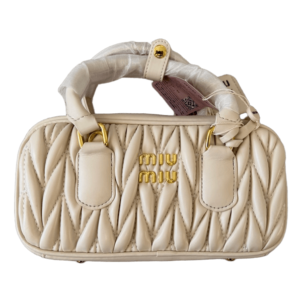 Cream quilted handbag