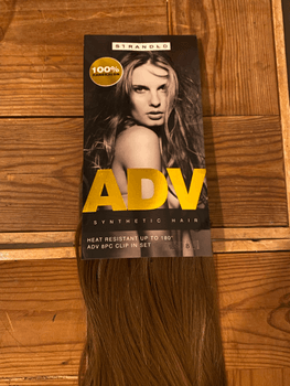 Brown clip-in hair extensions