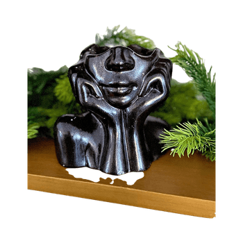 Black ceramic face vase
