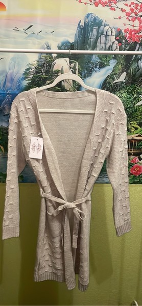 Beige knitted cardigan