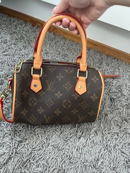 Ruskea Louis Vuitton laukku