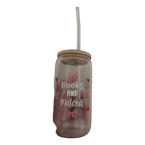 Glass cup with straw