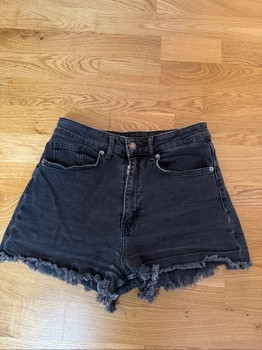 Black denim shorts