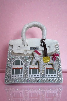 Bejeweled white handbag